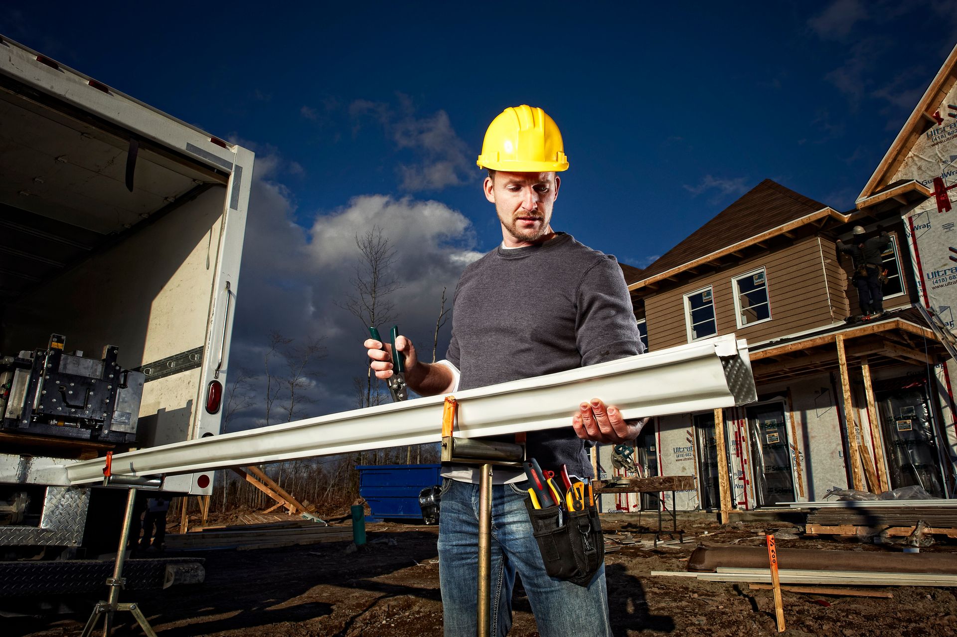 Photo of Crimping Gutter During Installation Process in Virginia Beach