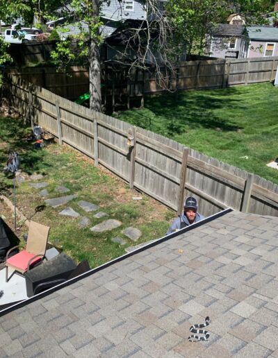 Our Gutter Installation Crew Installing Gutters in Virginia Beach Photo